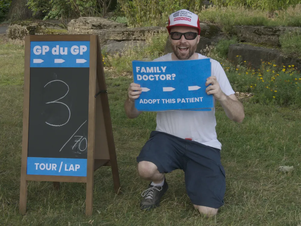 A cyclist in scrubs on the Circuit Gilles-Villeneuve